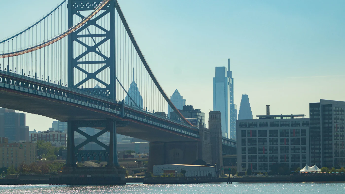 The Benjamin Franklin Bridge over the Delaware River, with the Philadelphia skyline behind it