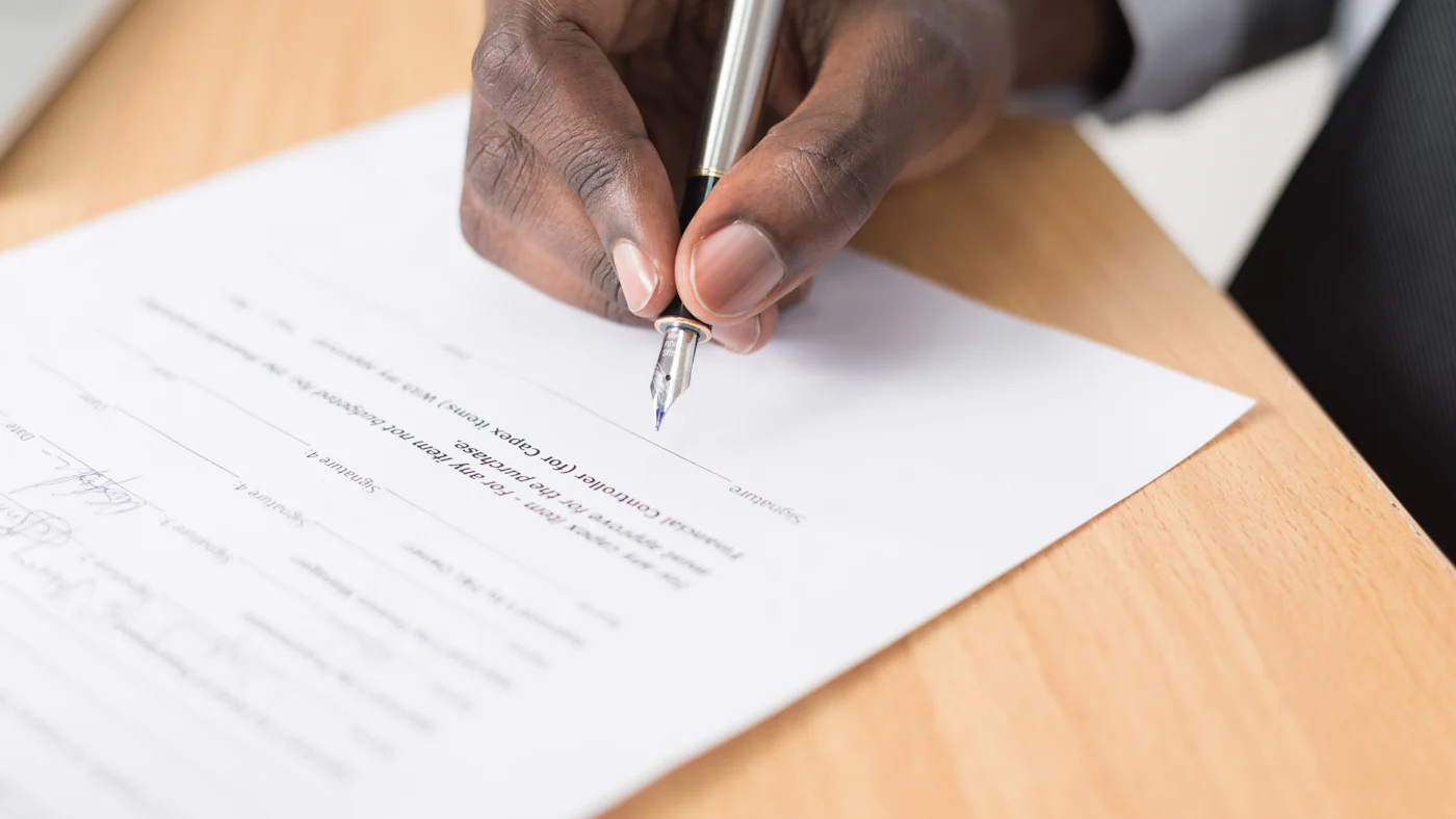 A person signing a document